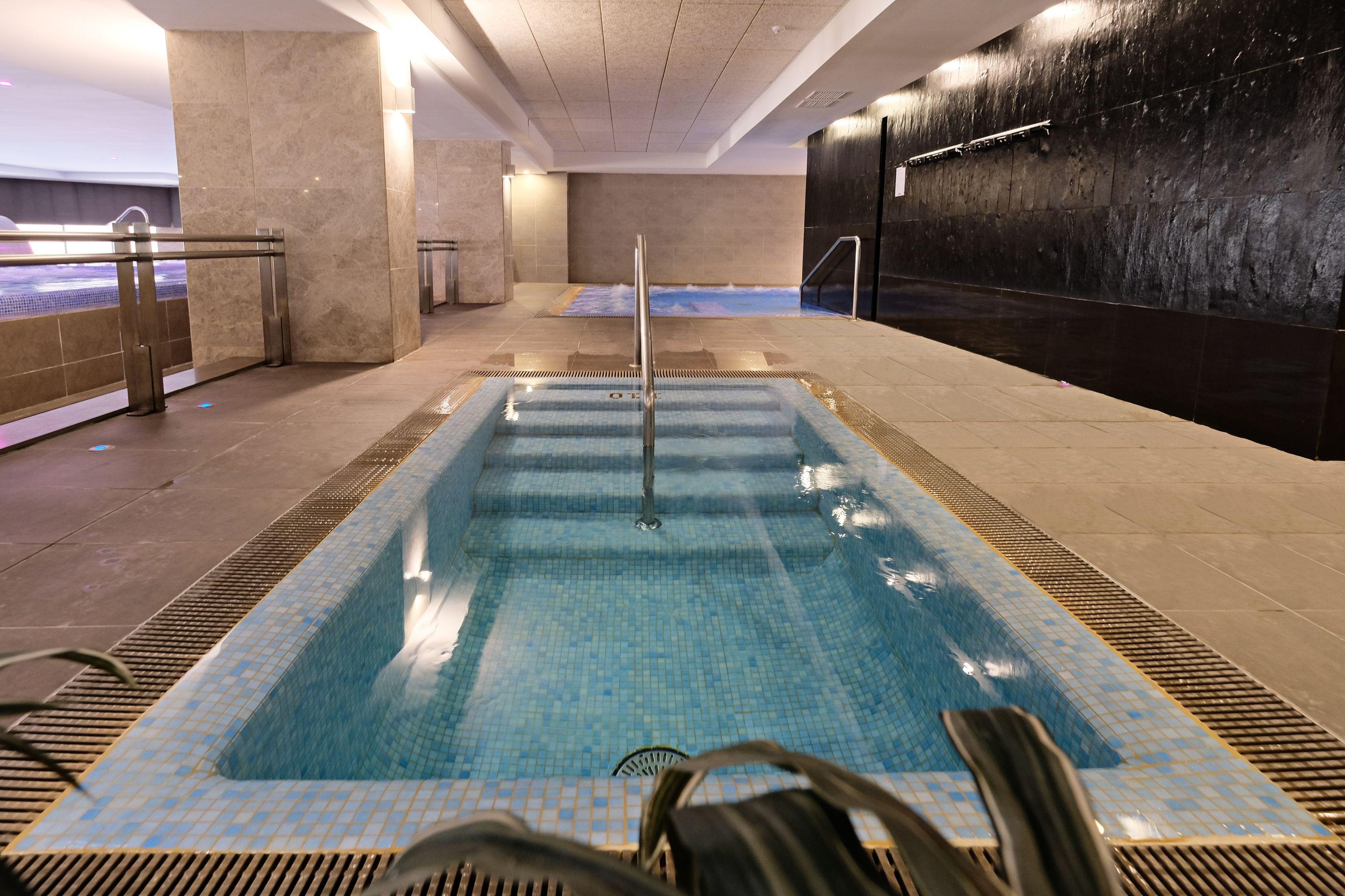 Hotel Envia Almeria Spa & Golf 阿瓜杜尔塞 外观 照片 The swimming pool at the hotel